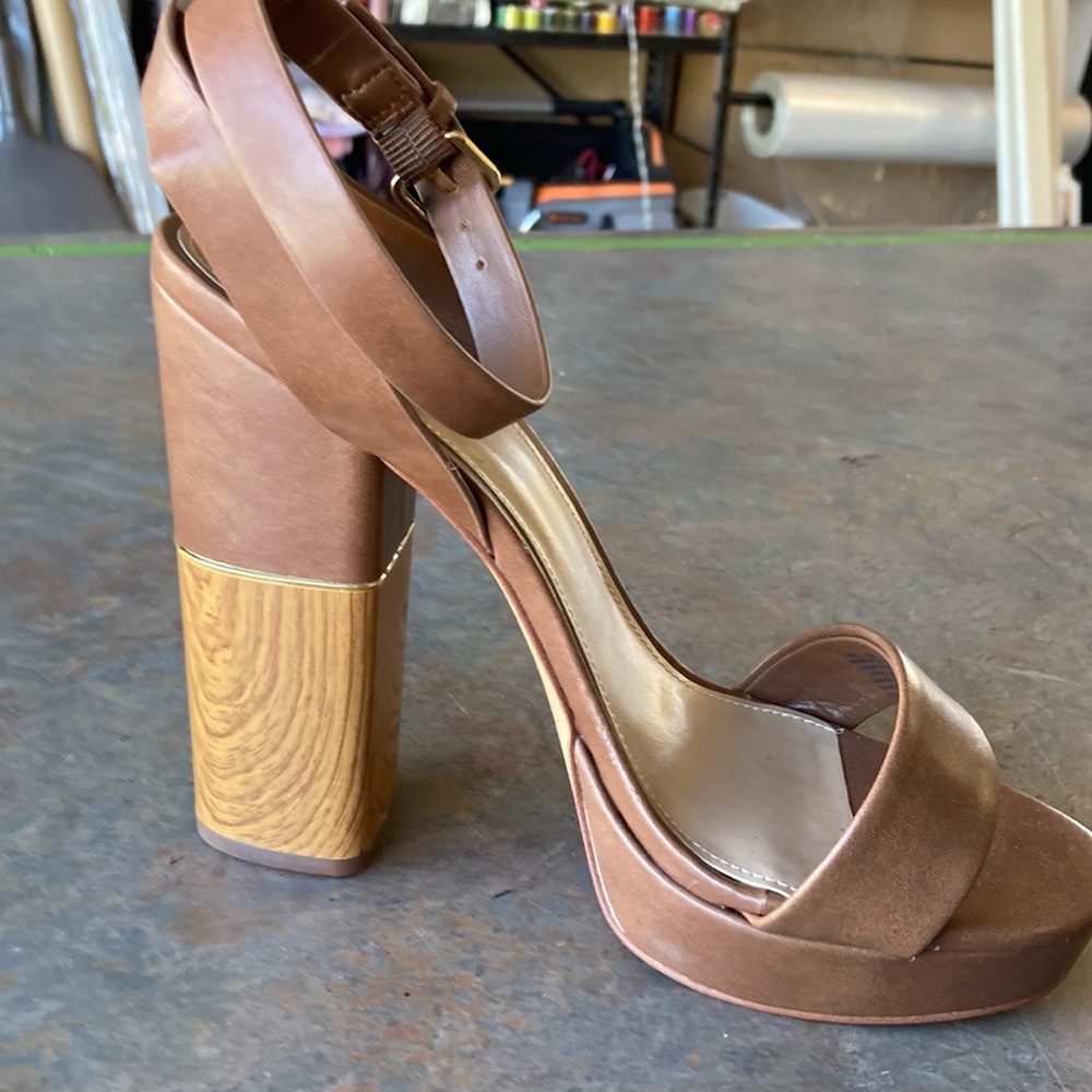 Pair of size 10 platform Aldo shoes.